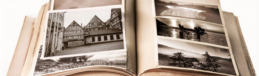 Im Hintergrund das Matterhorn. Im Vordergrund eine Betonbegrenzungsmauer, darauf als Graffiti die schweizer Flagge und der Schriftzug Literatur Swiss Made.
